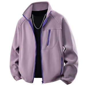 Close-up of purple polar fleece jacket with stand collar and zipper pockets