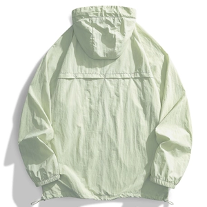 Detail view of mint green hooded sun jacket with breathable back vent and adjustable hem