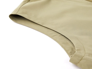 Detail showing high-quality double-needle stitching on khaki outdoor vest fabric