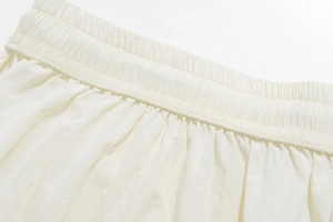 Close-up of elastic waistband with reinforced stitching on quick-dry casual shorts