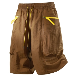 Brown summer cargo shorts for men with yellow drawstring and zipper utility pockets