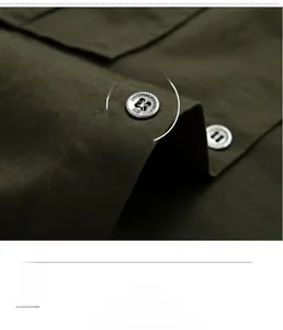 Macro detail of military green cotton fabric with engraved button and chest strap feature