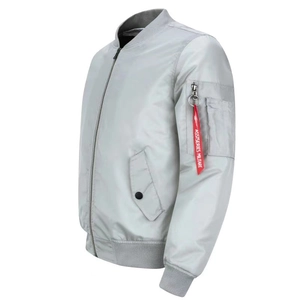 Detail of light gray bomber jacket with functional sleeve pocket and red ribbon tag