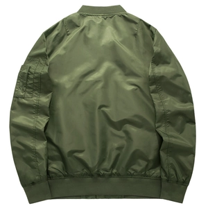Detail view of the olive green bomber jacket back with nylon texture and ribbed hem