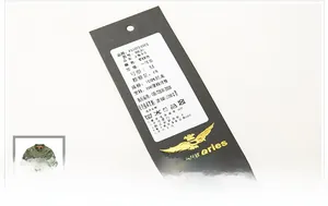 Detail of army green bomber jacket tag showing 100% nylon fabric and size M specs
