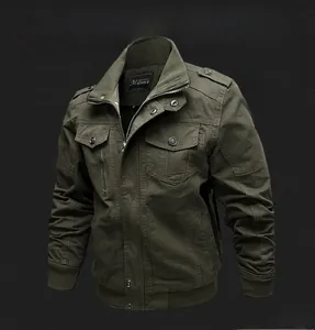 Detail of army green cotton jacket showing utility pockets and rib-knit cuffs on dark texture