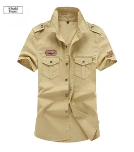 Detailed front view of khaki military short sleeve shirt with shoulder epaulettes and badges