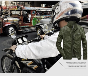 Detail view of army green PU leather biker jacket with stand collar and zipper pockets