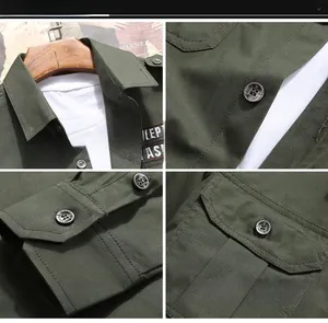 Detailed view of olive cotton shirt featuring military epaulettes and secure utility pockets