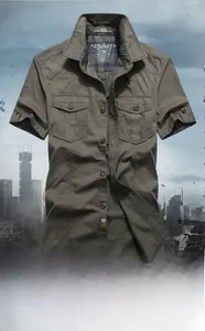 Detail of military green cotton cargo shirt with dual chest pockets and retro collar print
