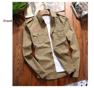 Flat lay detail of khaki military shirt with epaulettes, chest pockets and tactical patches