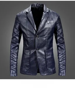 Detailed macro view of the navy blue PU leather texture on a slim fit men's blazer