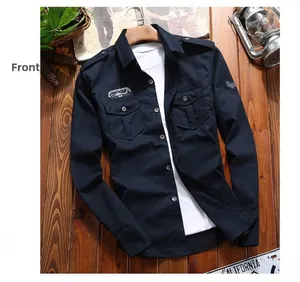 Detail of navy blue tactical military shirt with chest pockets and shoulder epaulets