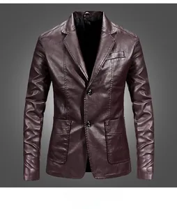 Detailed view of deep brown slim fit leather blazer with peak lapels and twin front pockets