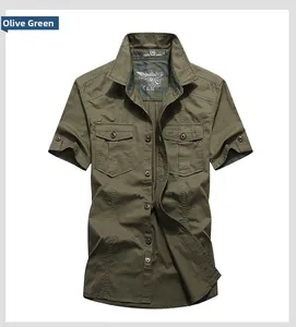 Detail of pea green short-sleeved work shirt featuring dual chest pockets and durable cotton