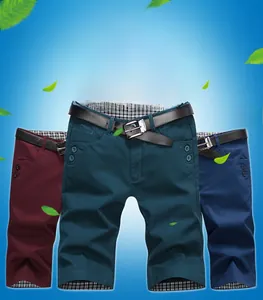 Detail view of cotton summer shorts in burgundy, dark green and navy with decorative belts
