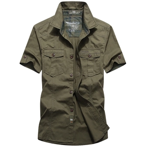 Army green military style cotton short sleeve shirt with chest pockets on white background