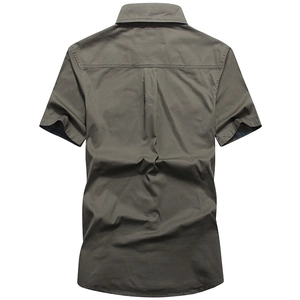 Army green men's cotton cargo short sleeve shirt with back box pleat detail and flat lay view