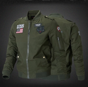Detail view of military green bomber jacket featuring American style embroidery patches