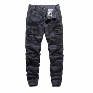 Detail of cargo pants showing camo pattern, flap pockets and ribbed jogger cuffs