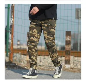 Detail of cargo pants showing side flap pockets and camouflage pattern for outdoors