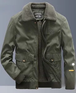 Detail of army green thermal jacket with grey fleece lining and chest embroidery