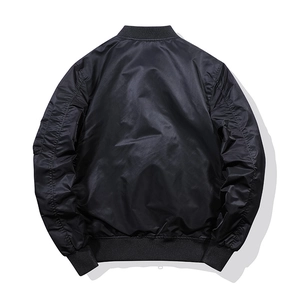 Detailed back view of a black bomber jacket with ribbed cuffs and sleeve utility pocket