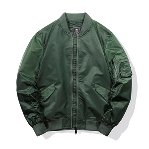 Detail of army green MA-1 bomber jacket with ribbed collar and zip pocket on sleeve