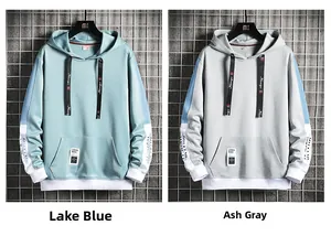 Vue détaillée des sweats à capuche bleu lac et gris avec panneaux contrastés et cordons