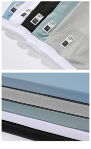 Vue détaillée des sweats à capuche avec écussons de marque et poignets côtelés