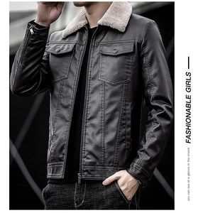 Detail of men's leather jacket featuring a soft shearling collar and flap chest pockets