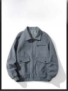 Detail of grey corduroy jacket with zipper closure and large functional cargo pockets