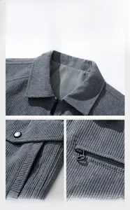 Detail of grey corduroy jacket showing lapel collar, metal zipper, and textured pocket