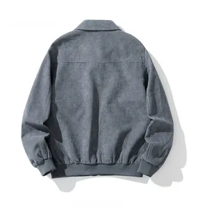 Detailed back view of dark grey corduroy jacket featuring classic ribbed cuffs and hem