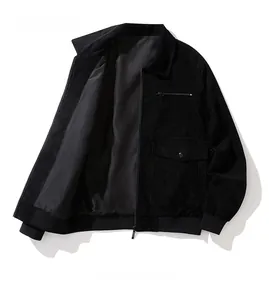 Detail view of the black corduroy jacket interior showing smooth lining and premium texture
