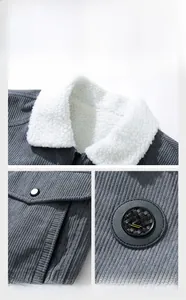 Detail view of men's gray corduroy jacket with warm fleece collar and badge