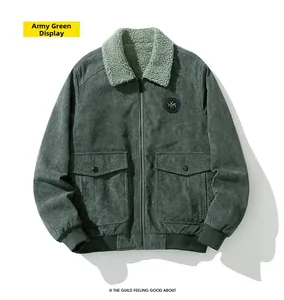 Detail of army green corduroy jacket with beige sherpa collar and metal zipper closure