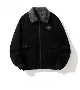 Detail of men's corduroy jacket with grey faux fur collar and ribbed cuffs in black