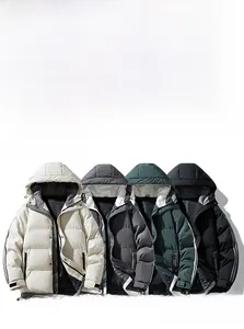 Detail of oversized hooded puffer jackets in beige, dark grey, green and black colors