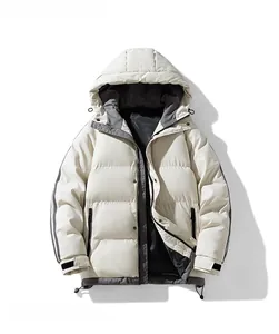 Flat lay of a beige hooded puffer jacket with grey lining and windproof drawstring detail