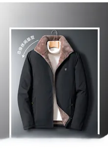 Detail view of men's winter jacket with warm brown faux fur lining and high stand collar