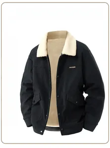 Detail of warm sherpa lining and fine corduroy texture on black mens winter jacket