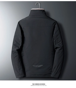 Macro detail of men's black stand collar jacket with white artistic text on back hem