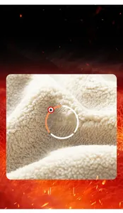 Close-up of thick white faux shearling lining showing soft high-density thermal texture
