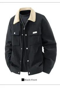 Detail of black corduroy jacket with contrast beige faux shearling collar and front pockets