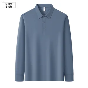 Detail of grey blue cotton polo shirt showing the collar, three buttons, and fabric texture