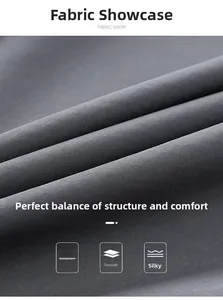 Close-up of windproof dark grey jacket fabric showing smooth and wrinkle-free texture