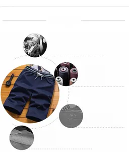 Detail of dark blue men's shorts showing elastic drawstring waist and fabric texture