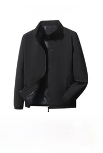 Detail of men's black jacket with zipper pocket, elastic cuff, and smooth inner lining