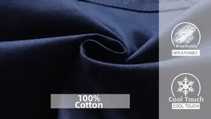 Macro shot of 100% cotton dark blue fabric texture showing twill weave and softness